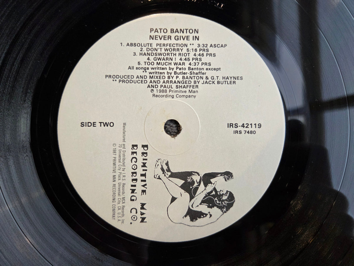 PATO BANTON NEVER GIVE IN