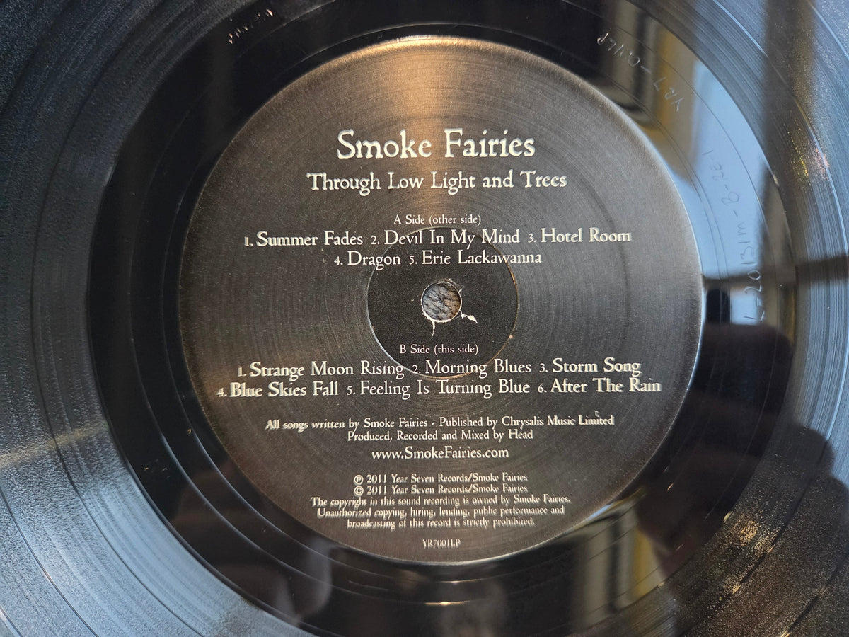 SMOKE FAIRIES THROUGH LOW LIGHT AND TREES