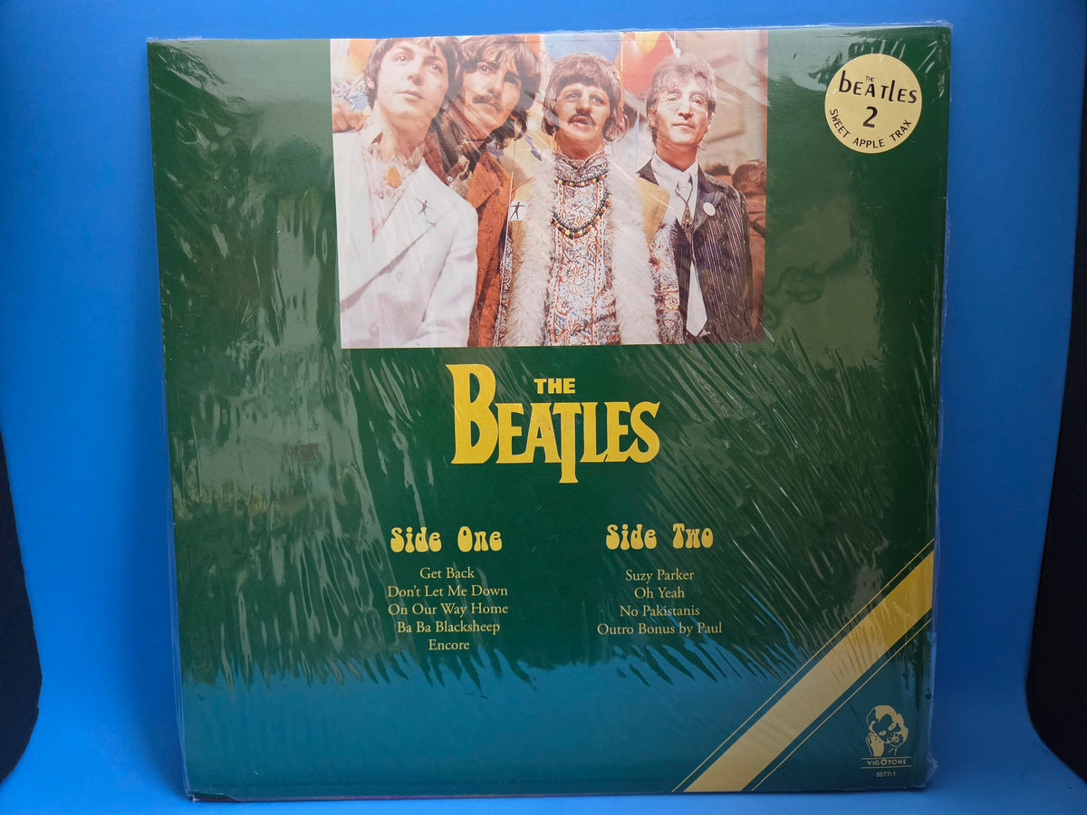 BEATLES SMOKING BEHIND STRAWBERRY FIELDS NEW