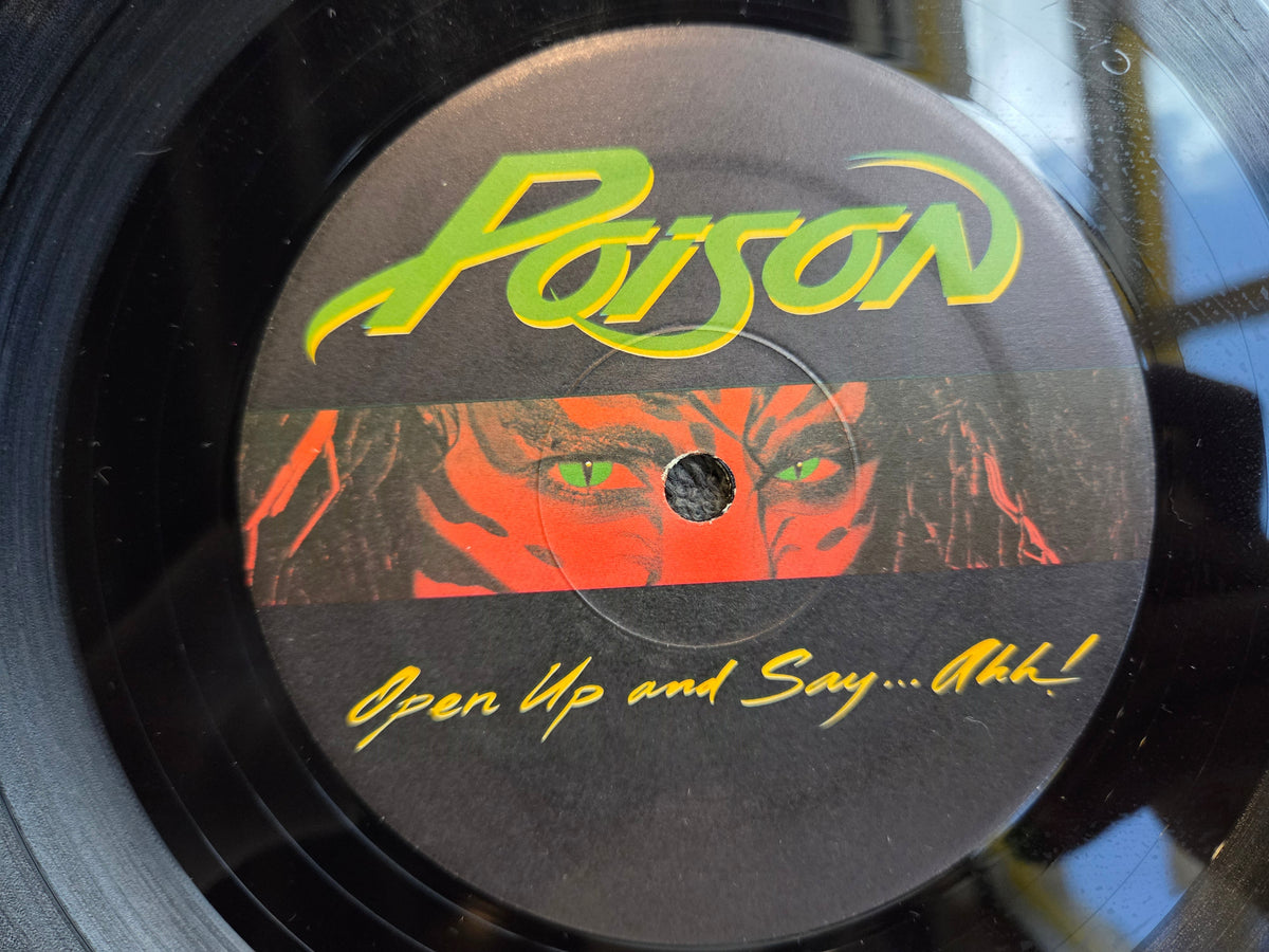 POISON OPEN UP AND SAY AHH!