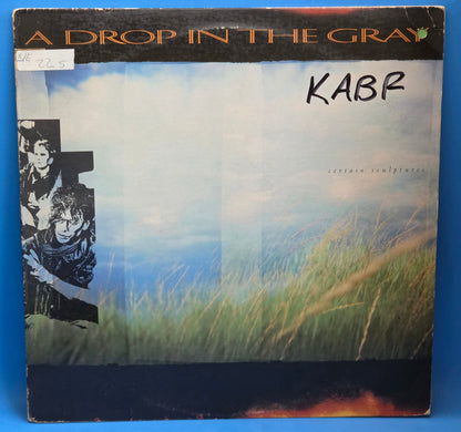 A DROP IN THE GRAY CERTAIN