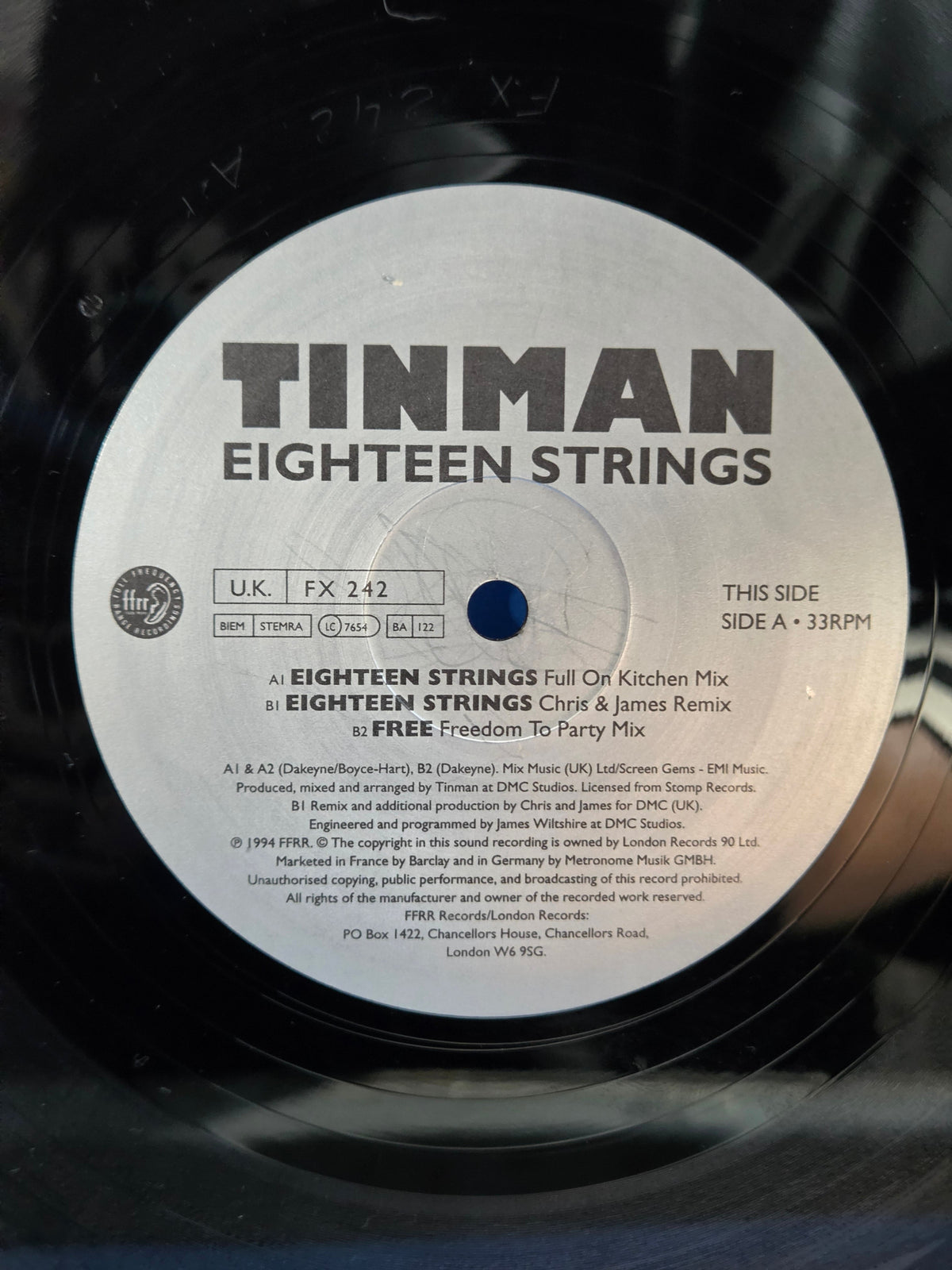 TINMAN EIGHTEEN STRINGS UK IMP 12"