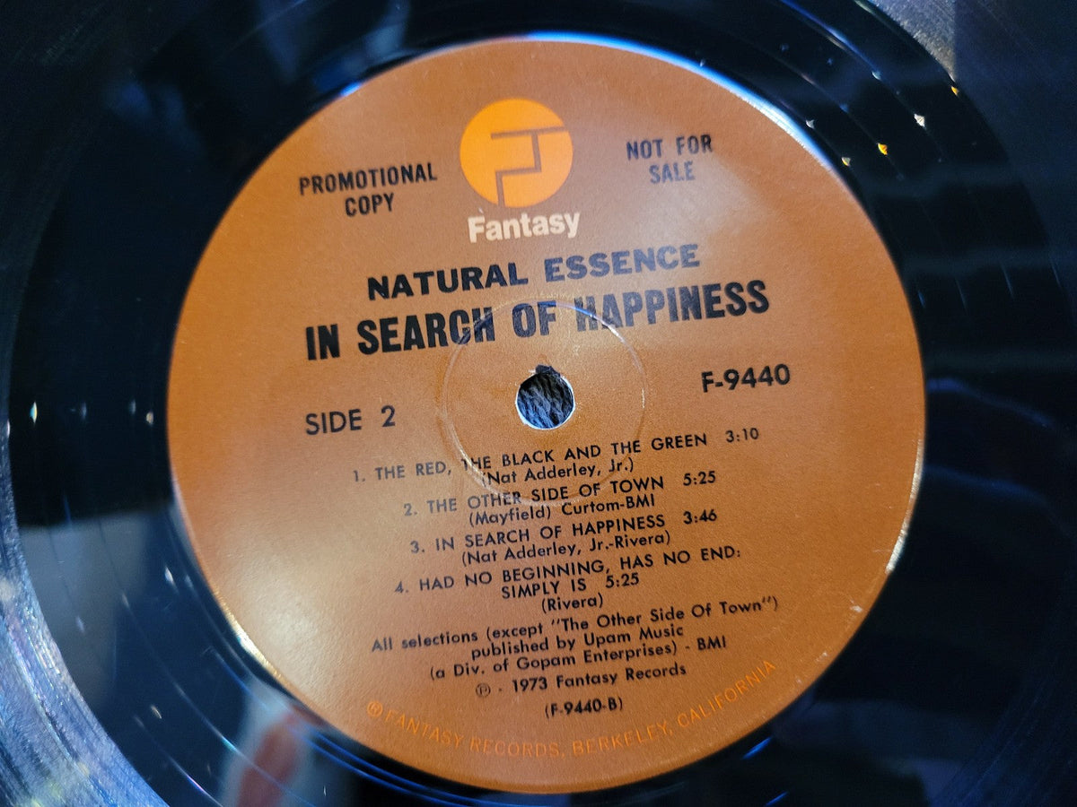 NATURAL ESSENCE IN SEARCH OF HAPPINESS